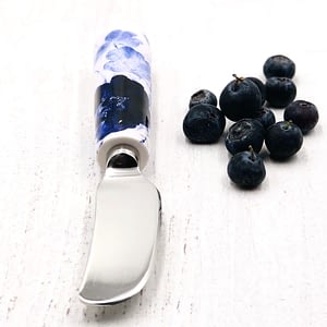 Blue and white spreader or butter knife